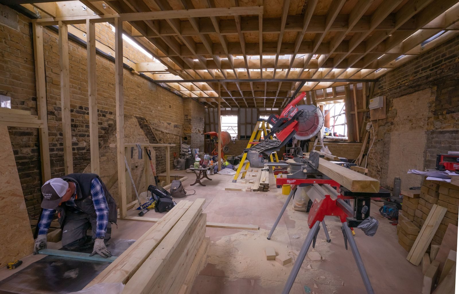 Mavens Building team on site amid the timber structure