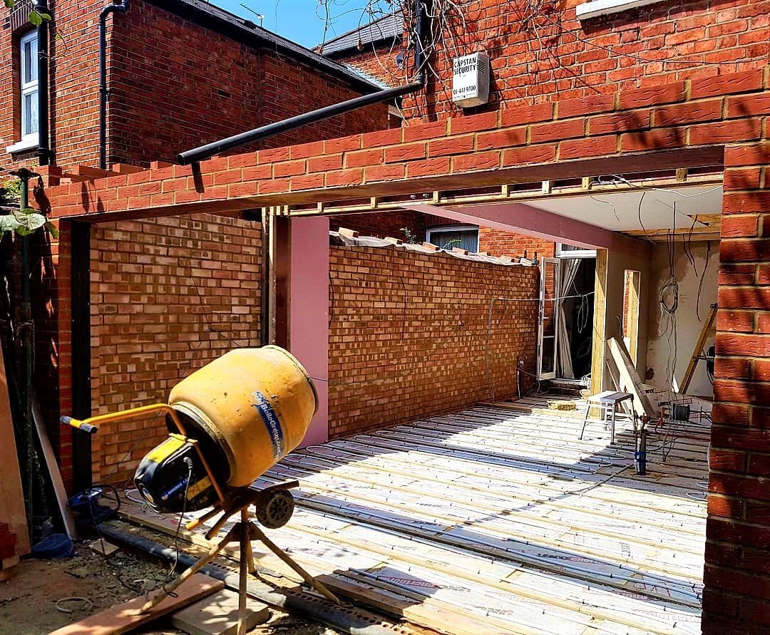 A Mavens Building rear extension under construction in London — building the structure the design depends on